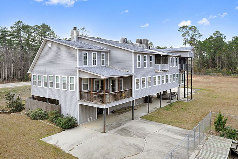 ms-gulf-coast-real-estate-team-sells-6-000-square-foot-waterfront-home